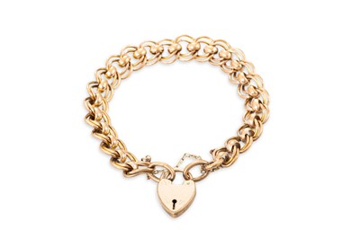 Lot 415 - A VINTAGE CURB LINK BRACELET, with padlock clasp
