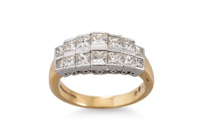 Lot 304 - A DIAMOND DOUBLE ROW GRADUATED RING, the...
