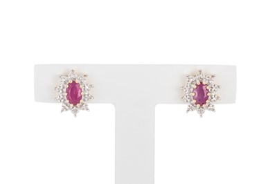 Lot 105 - A PAIR OF DIAMOND AND RUBY CLUSTER EARRINGS,...
