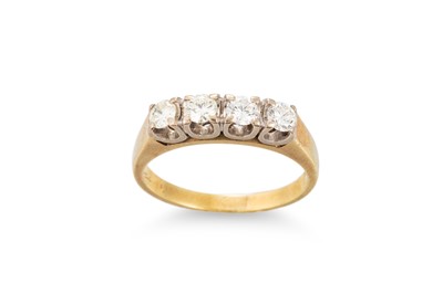 Lot 311 - A FOUR STONE DIAMOND RING, the brilliant cut...