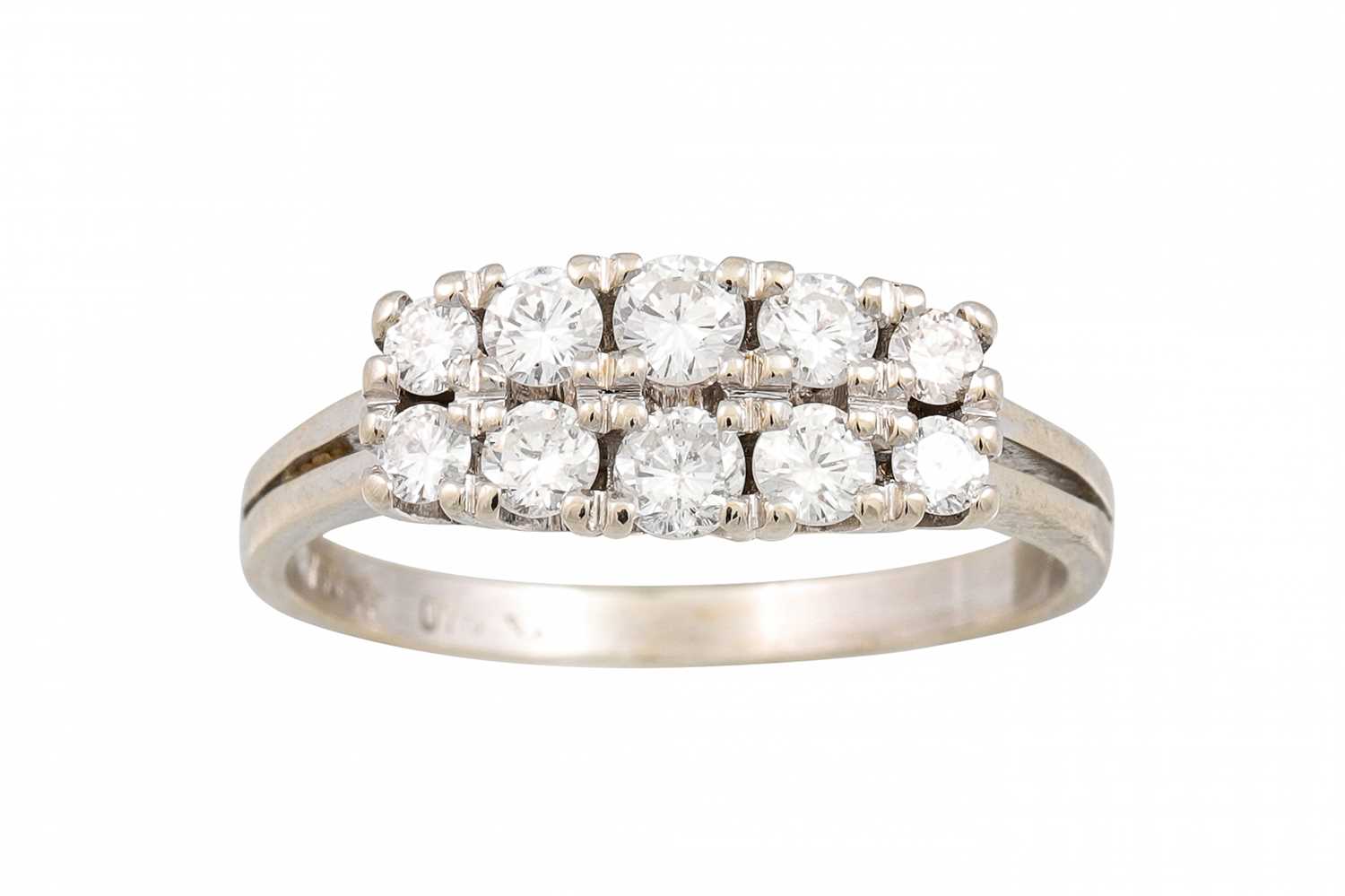 Lot 303 - A VINTAGE TWO ROWED DIAMOND RING, set with...