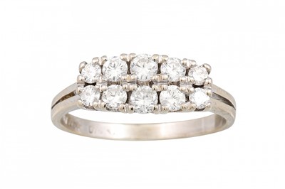 Lot 303 - A VINTAGE TWO ROWED DIAMOND RING, set with...