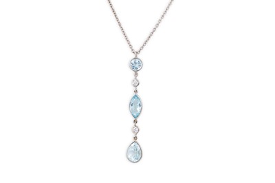 Lot 136 - AN AQUAMARINE AND DIAMOND PENDANT, the three...