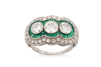 Lot 203 - AN EMERALD AND DIAMOND RING, the triple...