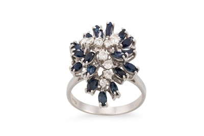 Lot 206 - AN ABSTRACT SAPPHIRE AND DIAMOND RING, of...