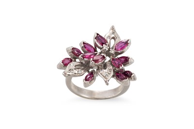 Lot 322 - A RUBY AND DIAMOND CLUSTER RING, of abstract...