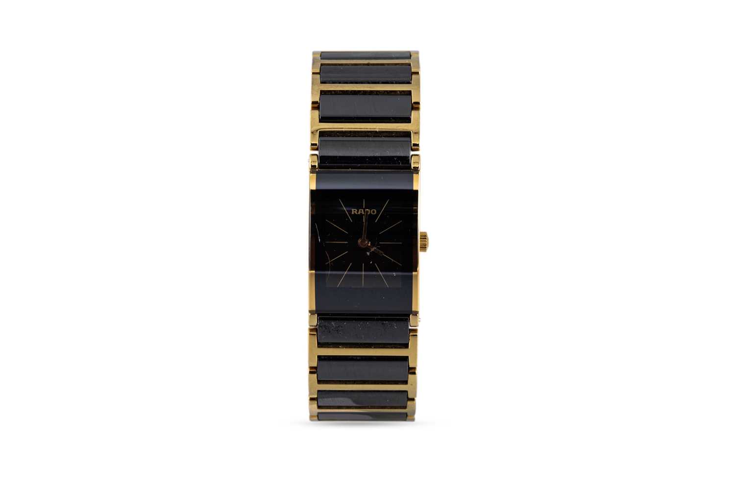 Lot 453 - A GENT'S RADO WRISTWATCH, black rectangular