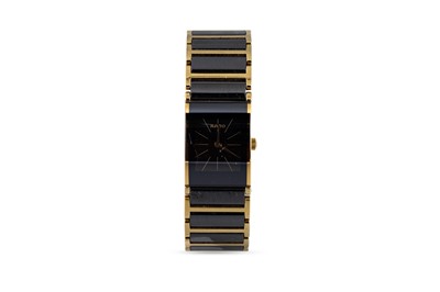 Lot 453 - A GENT'S RADO WRISTWATCH, black rectangular...