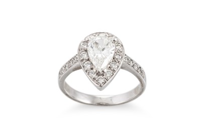 Lot 257 - A DIAMOND CLUSTER RING, the pear shaped...