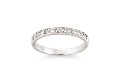 Lot 258 - A DIAMOND SET HALF ETERNITY RING, mounted in...
