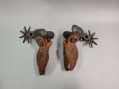 Lot 514 - AN UNUSUAL PAIR OF AMERICAN STYLE EQUINE SPURS,...