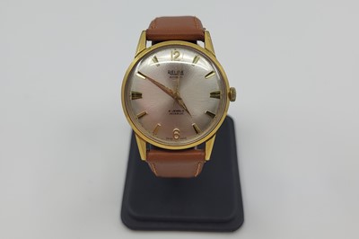 Lot 424 - A GENT'S RELIDE AUTOMATIC GOLD-PLATED...