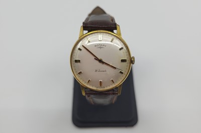 Lot 427 - A GENT'S ROTARY WRISTWATCH, baton markers,...
