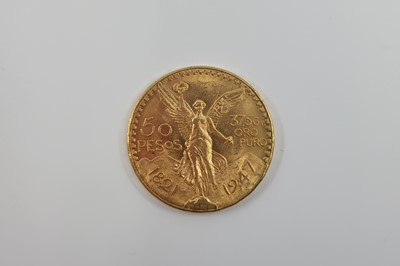 Lot 454 - A 1947 MEXICO 50 PESO 1.20 TROY OZ GOLD COIN,...