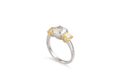 Lot 312 - A FANCY VIVID YELLOW AND WHITE DIAMOND THREE...
