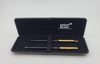 Lot 508 - A MONT BLANC WRITING SET, comprising a black...