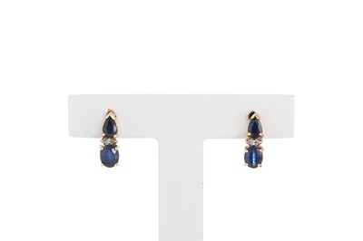 Lot 129 - A PAIR OF SAPPHIRE AND DIAMOND EARRINGS, set...