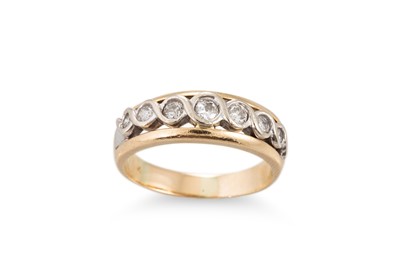 Lot 130 - A DIAMOND SEVEN STONE RING, the graduated...