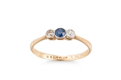 Lot 131 - A SAPPHIRE AND DIAMOND THREE STONE RING, the...