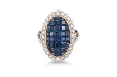 Lot 335 - A SAPPHIRE AND DIAMOND CLUSTER RING, the...