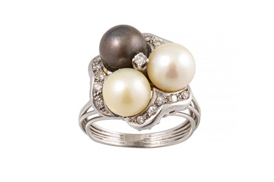 Lot 346 - A DIAMOND AND PEARL CLUSTER RING, set with...