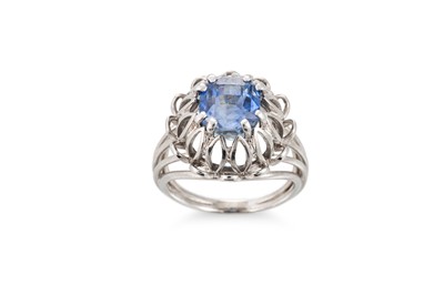 Lot 377 - A SAPPHIRE SET BOMBÉ RING, the step cut...