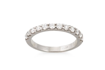 Lot 161 - A DIAMOND HALF ETERNITY RING, the round...