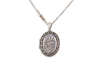 Lot 175 - A VICTORIAN SILVER LOCKET, on a vintage chain