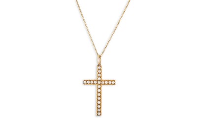 Lot 173 - AN ANTIQUE PEARL SET CROSS, in 15ct gold, on a...