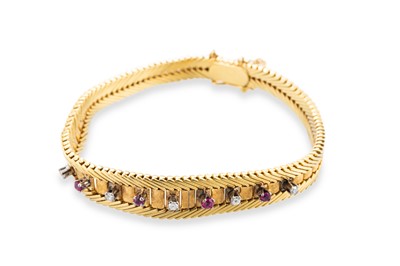 Lot 243 - A VINTAGE RUBY AND DIAMOND BRACELET, the...