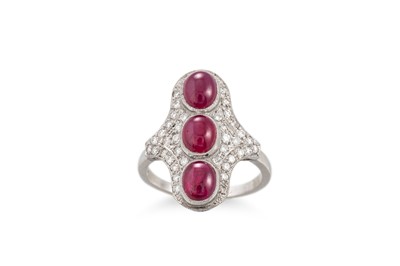 Lot 247 - A CABOCHON RUBY AND DIAMOND CLUSTER FINGERLINE...