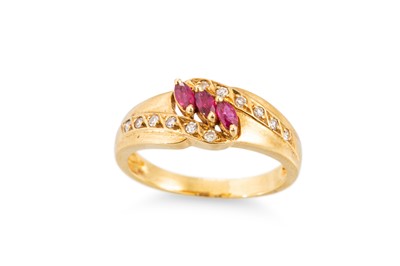 Lot 279 - A RUBY AND DIAMOND RING, set with three...