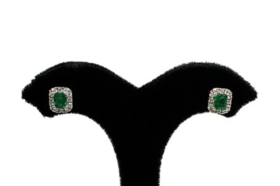 A PAIR OF EMERALD AND DIAMOND CLUSTER EARRINGS,...