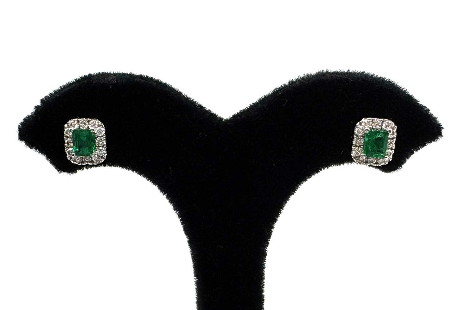 A PAIR OF EMERALD AND DIAMOND CLUSTER EARRINGS,...