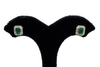 A PAIR OF EMERALD AND DIAMOND CLUSTER EARRINGS,...