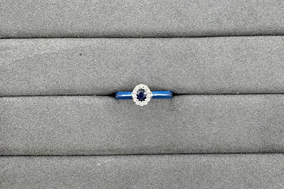 AN ENAMEL, SAPPHIRE AND DIAMOND RING, the oval...