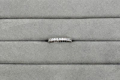 A SAPPHIRE FULL ETERNITY RING, the round...