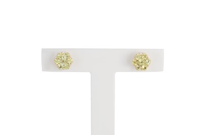 Lot 80 - A PAIR OF PERIDOT CLUSTER EARRINGS, mounted in...