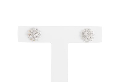 Lot 102 - A PAIR OF DIAMOND CLUSTER EARRINGS, the...