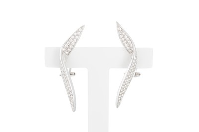 Lot 64 - A PAIR OF SHAPED DIAMOND SET EARRINGS, pavé...