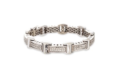Lot 49 - A DIAMOND SET BRACELET, the round diamonds set...