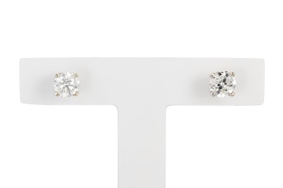 Lot 89 - A PAIR OF DIAMOND STUD EARRINGS, the round...