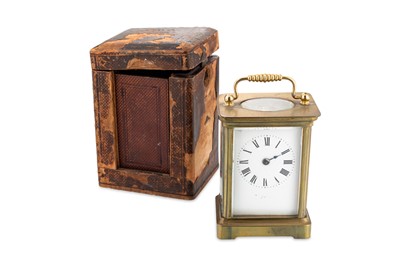 Lot 518 - AN ANTIQUE BRASS FRAMED CARRIAGE CLOCK, white...