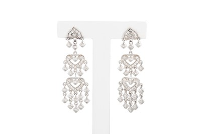 Lot 147 - A PAIR OF DIAMOND DROP EARRINGS, the brilliant...