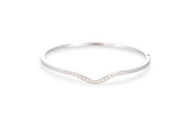 Lot 278 - A DIAMOND BANGLE, mounted in 18ct gold....
