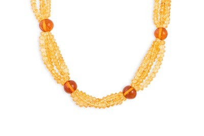 Lot 97 - A BEADED CITRINE NECKLACE, amber spacers to an...