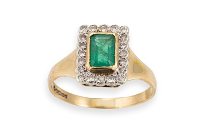 Lot 111 - AN EMERALD AND DIAMOND CLUSTER RING, mounted...