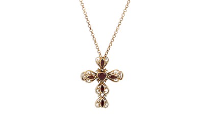 Lot 105 - A STONE SET 9CT GOLD CROSS PENDANT, on a 9ct...