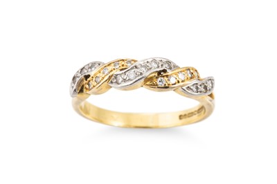 Lot 334 - A DIAMOND SET BAND RING, of twist form,...