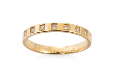Lot 106 - AN 18CT GOLD DIAMOND SET BAND RING, with...